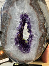 Massive 10.7 KG Amethyst Portal from Uruguay. Comes with swivel stand.