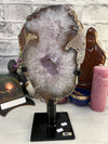 Beautiful 3 KG Amethyst Portal from Uruguay. Black metal swivel stand included