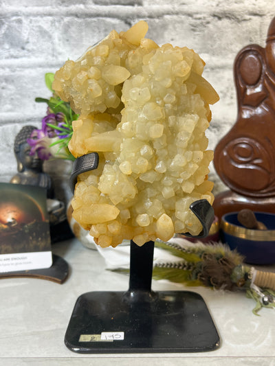 Beautiful Yellow Calcite Cluster on metal stand from Uruguay