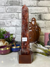 Gorgeous Fire Quartz Tower with wood base