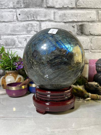 8.7 KG Labradorite Sphere with spinning wood base