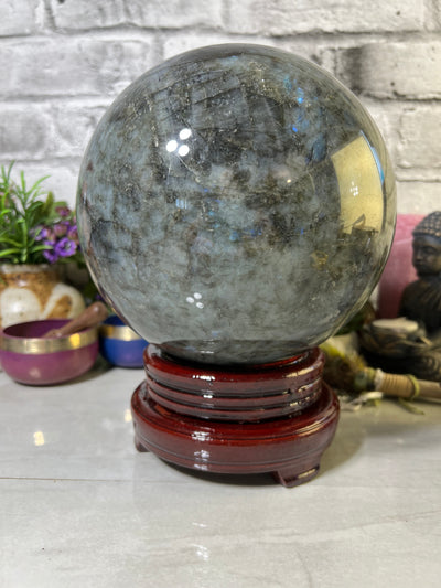 8.7 KG Labradorite Sphere with spinning wood base