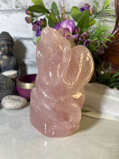 Beautifully Carved Cobra on rock Rose Quartz Carving