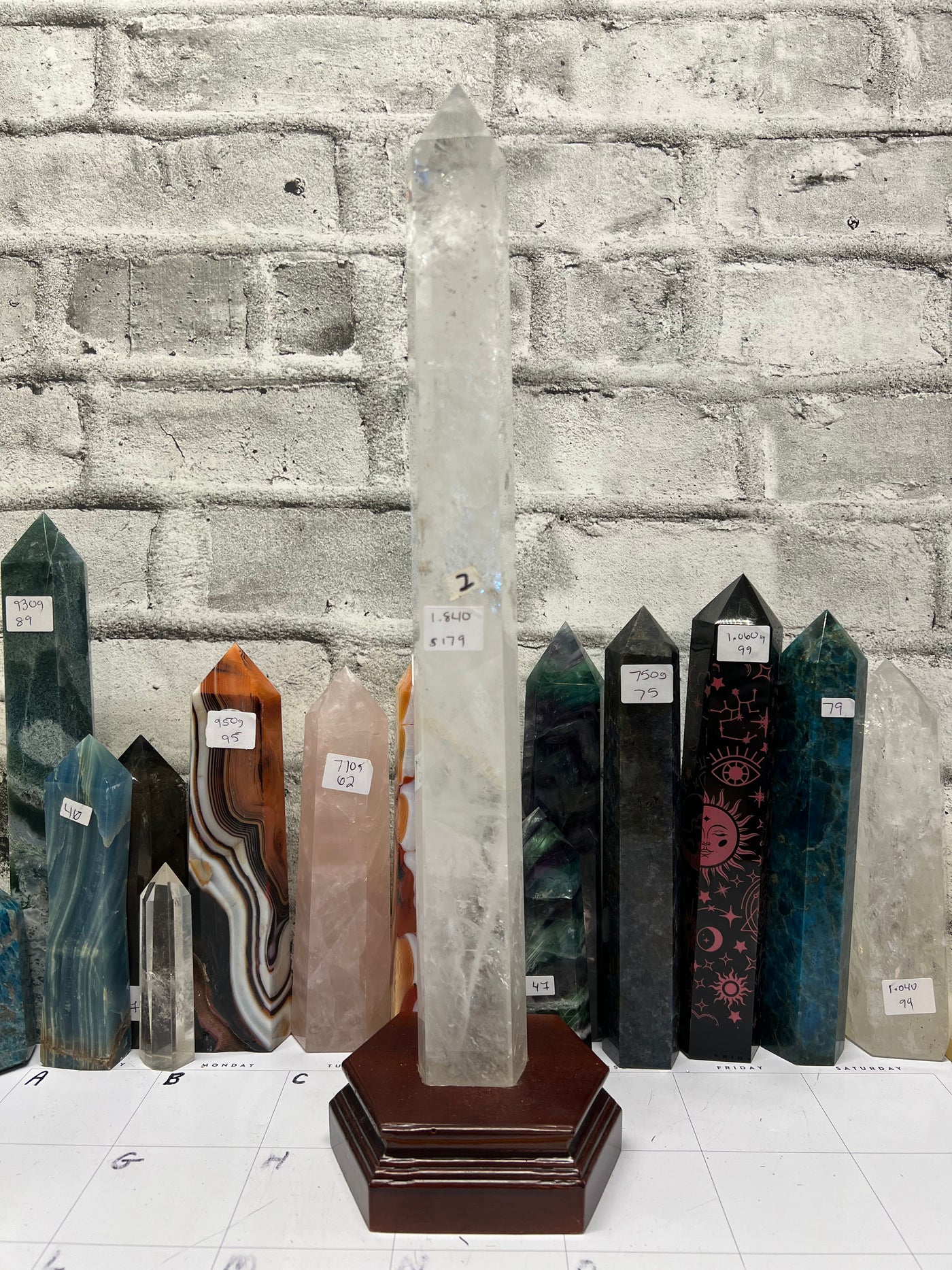 18” tall Clear Quartz Tower in wood base