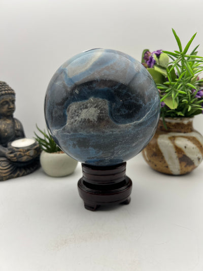 Beautiful Trolite Sphere on wood base